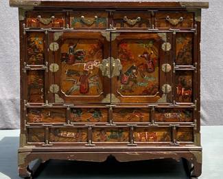 Asian paint decorated commode with brass accents