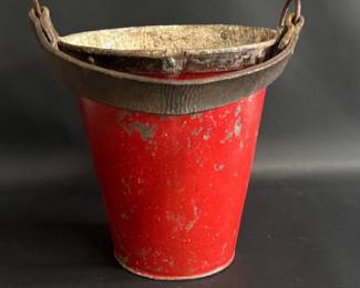 Vintage metal riveted fire bucket with leather handle