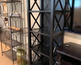 #10 Black Laminate 4 shelf Bookcase w/1 drawer - 22x15x72 (as is small chips) $75.00
#11 Black Laminate 4 shelf Bookcase w/1 drawer - 22x15x72 (as is small chips) $75.00