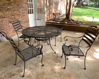 #114 Wrought Iron Table w/4 chairsm- 47Round x 28Tall (Table needs tightening) $75.00