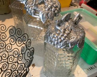 #57 Set of 3 Glass Cannisters w/Fruit/Silver Top - 10 - 11" Tall $30.00