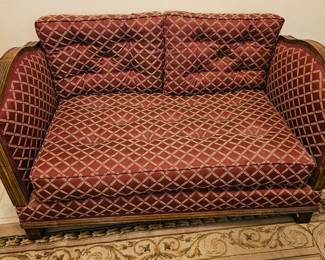An unusual Antique Loveseat that The ends pull out, seat pulls out to make a Bed.
Very rare .