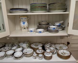 Blue Herend Chinese Garden dinner set top shelves and Herend Bird dinner set counter top