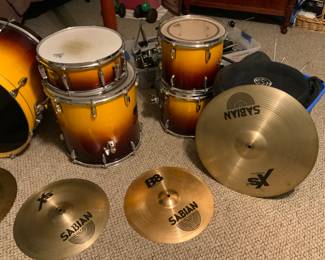 Pearl Export Select drum kit in an Autumn Fade finish. The kit includes a 22" bass drum, 12" and 13" rack toms, and a 16" floor tom.