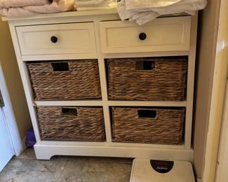 White Cabinet with Wicker Baskets