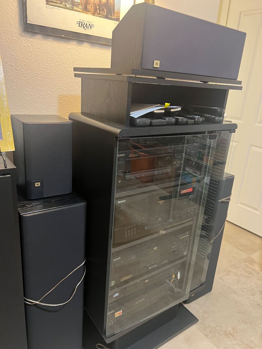 Several stereo systems, speakers and cases