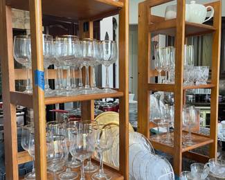 Gold Rimmed crystal wine glasses, plates and serving pieces