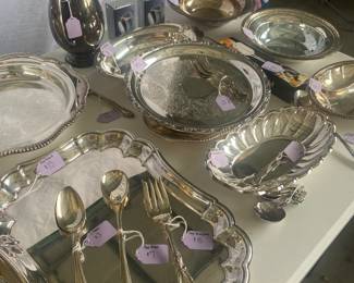 Assortment of silverware and platters
