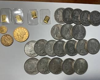 Gold coins, mini bars and Morgans and Peace Dollars