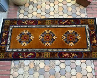 Hand knotted Wool Tibetan Rug. Measures 32” x 75”.