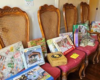 Puzzles $2 and Dining Room Set Chairs.
