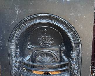Black wrought iron fireplace.