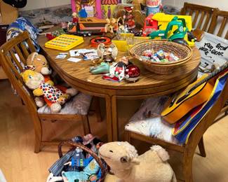 Baskets, Dolls, Camel Stuffed Animal, Wooden Table, Toys