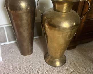 vintage brass vases with unique hammered textures. One features a decorative lid with chain detail, the other with elegant rope-twist handles.