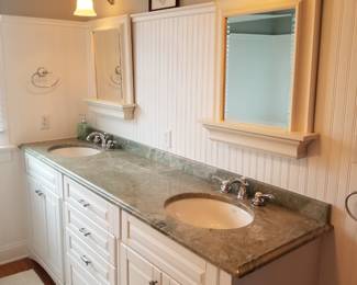 Magnificent double bath vanity; vanity mirrors; wall sconce lights