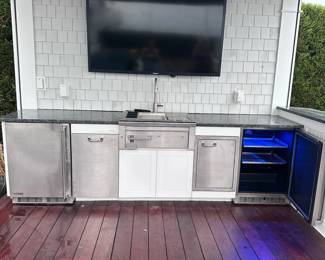 LYNX outdoor kitchen components: refrigerator; trash receptacle; sink; cupboard; refrigerator