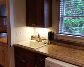 Laundry room cabinetry; sink