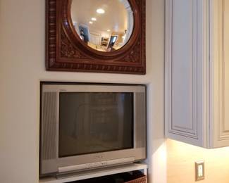 Wall mirror; TV
