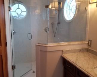 Glass shower surround