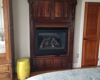Spectacular fireplace surround; garden stool