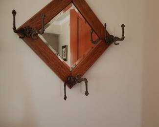 Mirrored hat rack