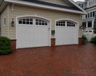 Garage doors are 9 ft. wide x 8 ft. tall