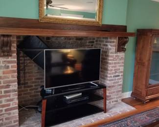 Large mirror; TV ; entertainment stand