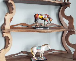 Ornate wall shelf; enameled horses