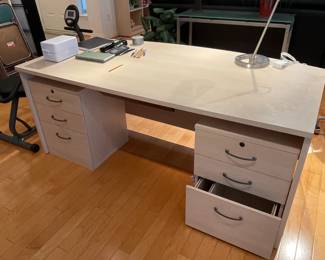 Desk with loads of workspace. Two file drawers can be moved in or out or away. Casters are included if you want the drawers to be independent.