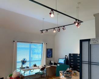 Light system extends in both ends of this room.