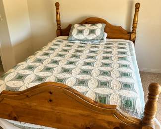 Pine Full/Queen Bed Frame – Classic turned post design, warm finish.