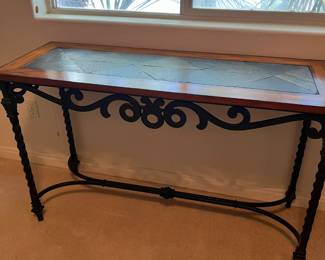Console Table with Slate Inlay – Black iron legs, tile top, wood trim.