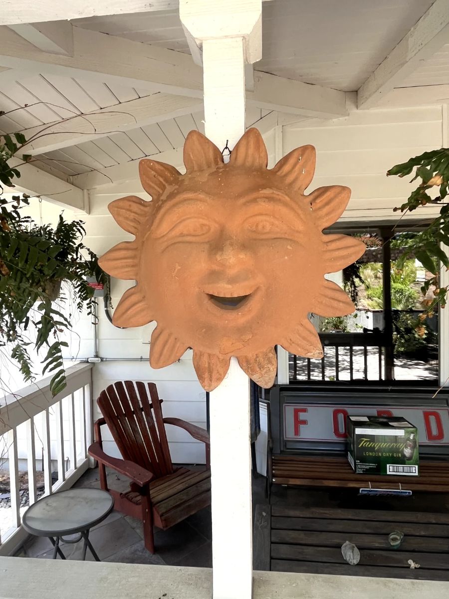 Nice ceramic sun wall hanging.