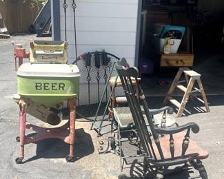 Random Stuff. Rocking chair. Old Maytag washer turned into ice chest.