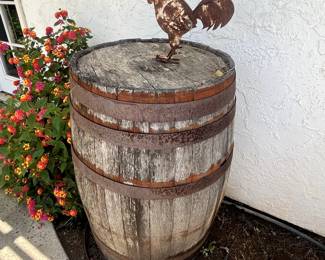 Whisky Barrel and metal chicken.
