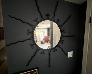 Wrought iron sun mirror.