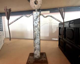 Cool metal art statue candle holder.