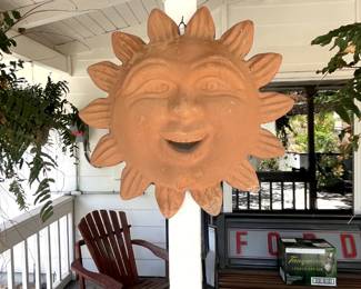 Nice ceramic sun wall hanging.