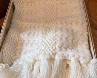 Soft white blanket with fringe