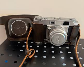 vintage rangefinder camera with leather case
