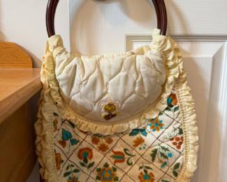 Vintage quilted handbag with wooden handle