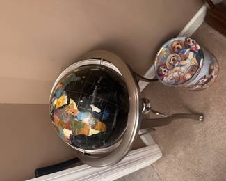 Globe and collectible dog tin