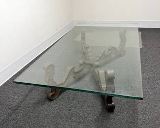 soild rosewood coffee table. 3'X5' temp glass top. $80