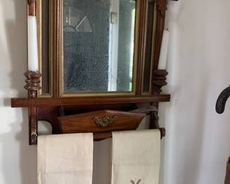 Antique mirror with candles and towel rack…sweet little guy!