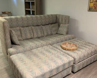 Great seating for tv watching …two large ottomans…could even be an extra sleeping spot for unexpected guests! Very versatile.