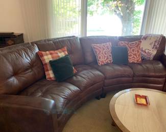 Flexsteel leather curved sofa in two pcs for easy moving…like new!