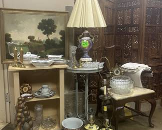 A little of this, a little of that - lamps, home decor, glass bowls, framed art, and a set of fine china.  
