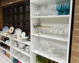 Fine china, ceramic cookie jars, beautiful glasses, and assorted barware