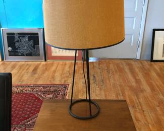 One of a pair of iron tripod lamps
