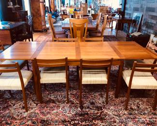 Teak extension dining table, marked AM Made in Denmark, comes with 8 Svegards Markayrd teak chairs
